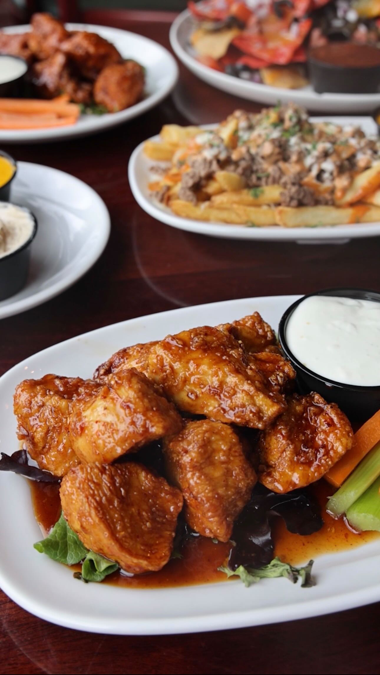 These wings hit harder than the Pike at 5PM — crispy, saucy, and guaranteed to cause delays. 🍗🔥🚗

Half off wings every Thursday at JnJ!